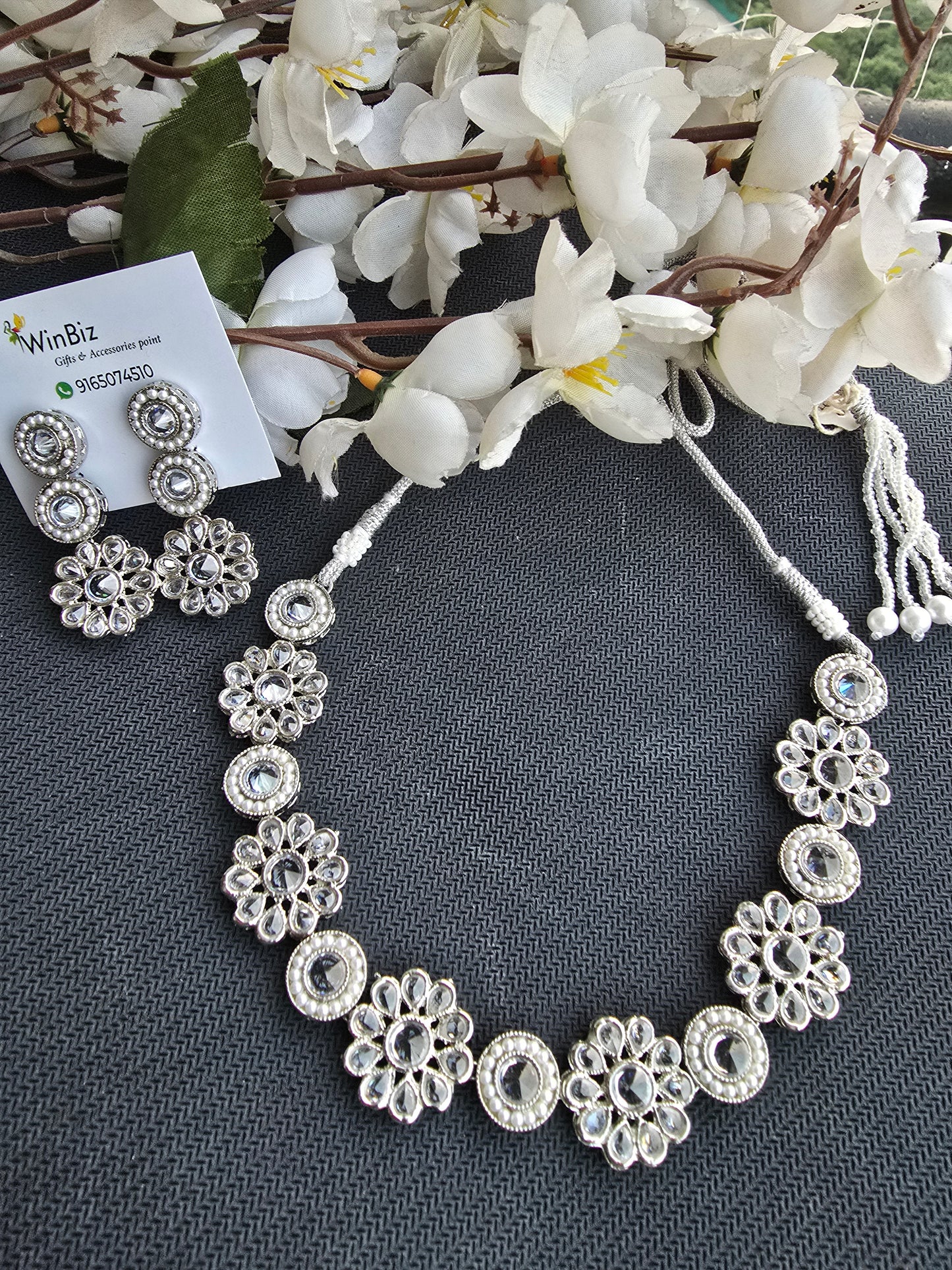 Silver set with flower pattern