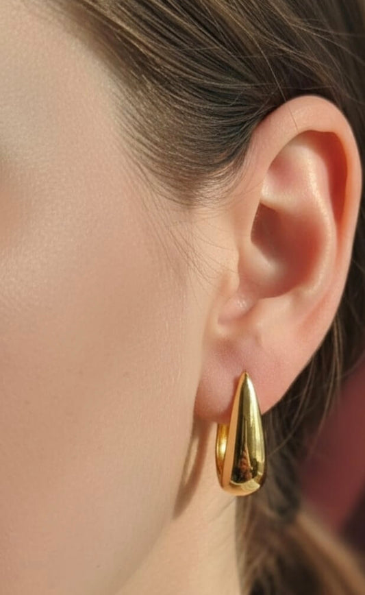Golden Metal Tear Drop Stud Earrings.