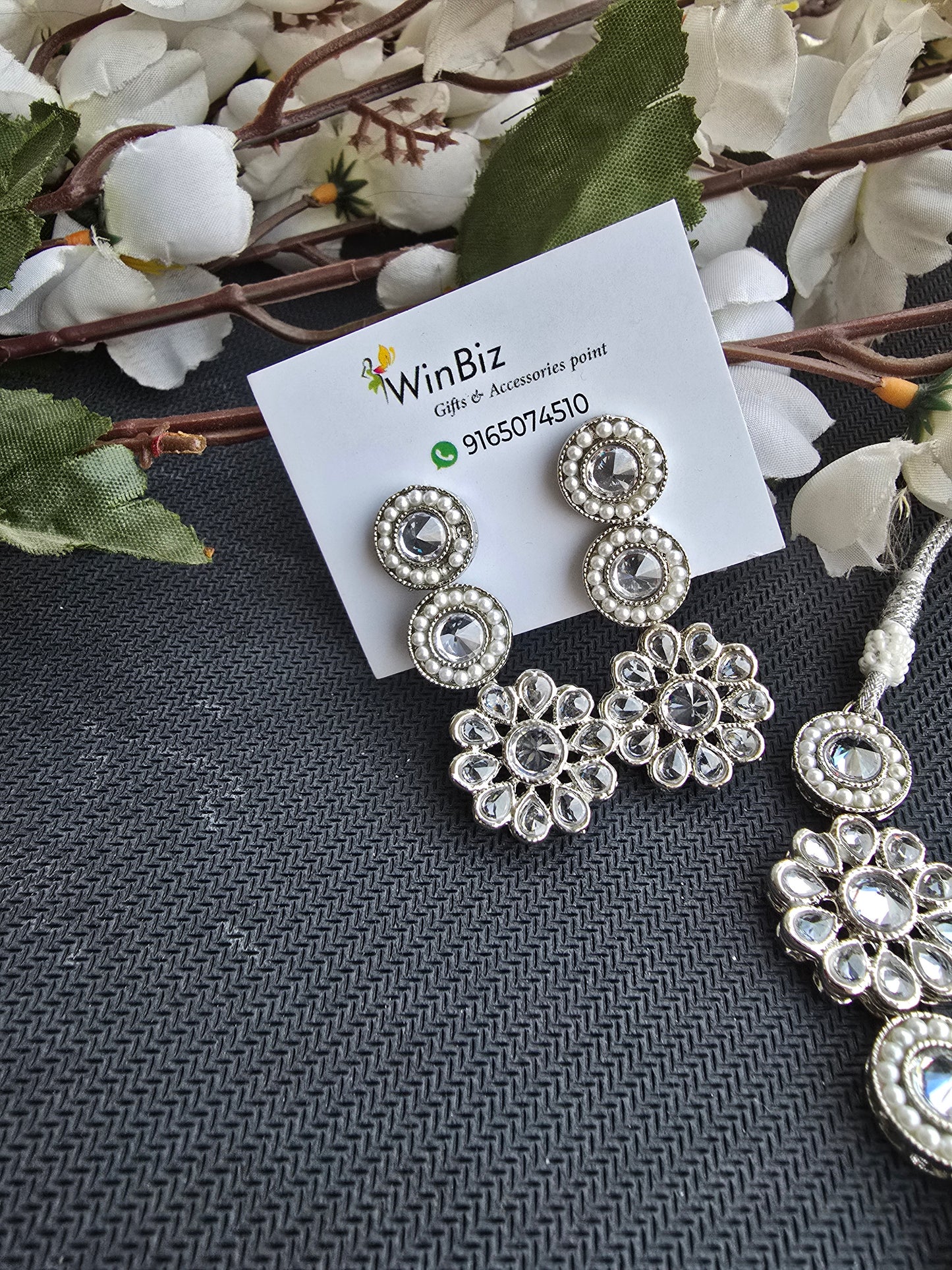 Silver set with flower pattern