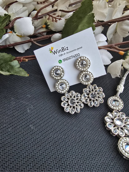 Silver set with flower pattern