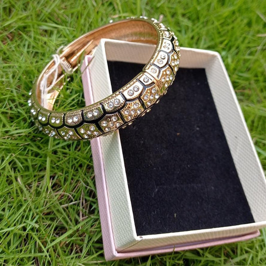 Bronze-toned hinged bracelet