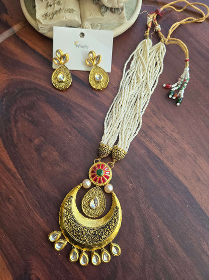 Gold Plated Kundan Set With Pearl Strings