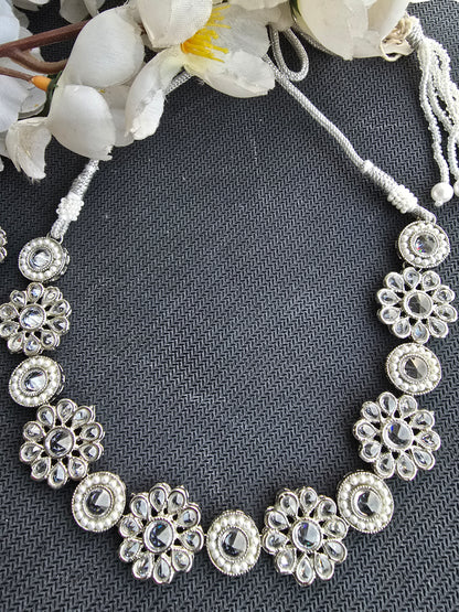Silver set with flower pattern