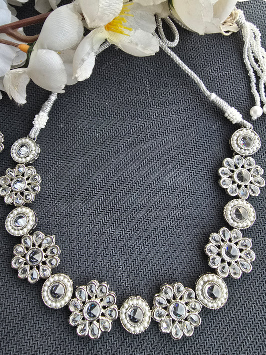 Silver set with flower pattern
