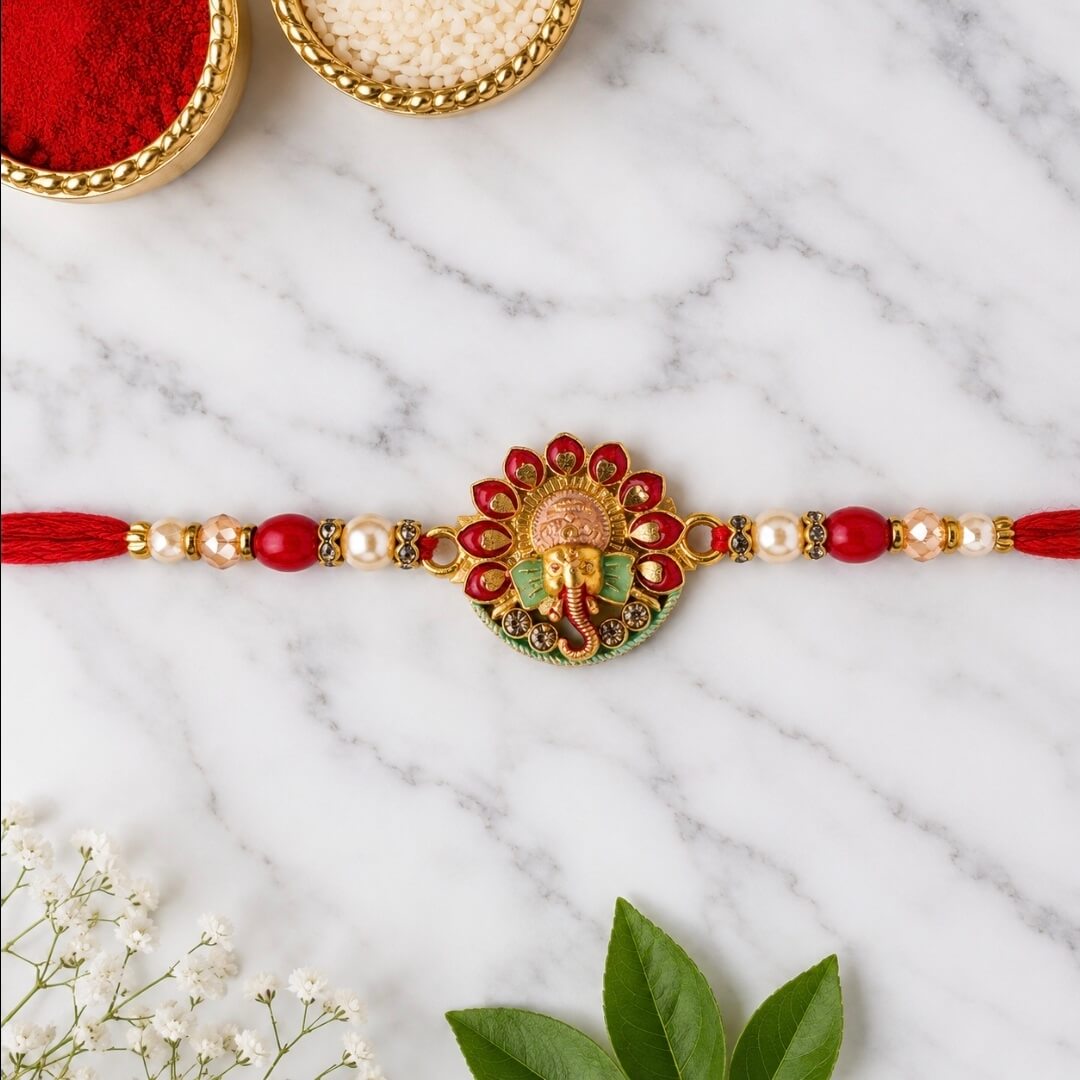 Designer Ganesha Rakhi with Red Beads & Gold-Tone Detailing with Roli Chawal | Raksha Bandhan Rakhi