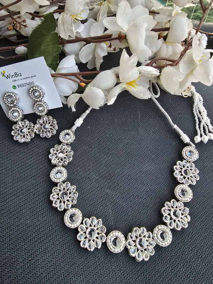 Silver set with flower pattern