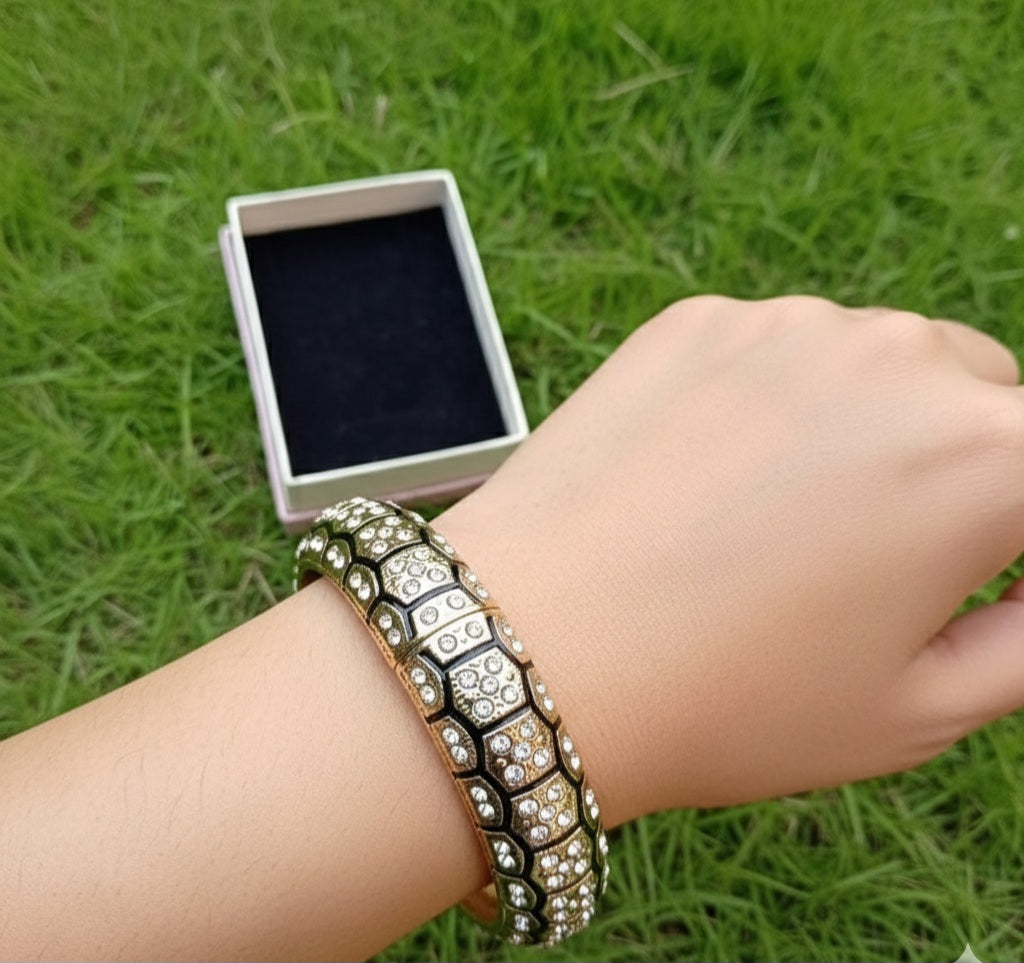 Bronze-toned hinged bracelet