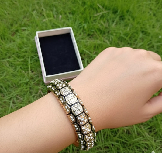 Bronze-toned hinged bracelet