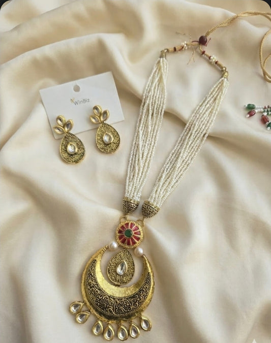 Gold Plated Kundan Set With Pearl Strings
